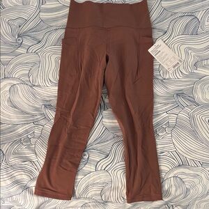 Athleta Salutation Stash Pocket II Capri Leggings